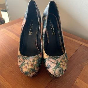 Aldo very high wedges. Floral print throughout.